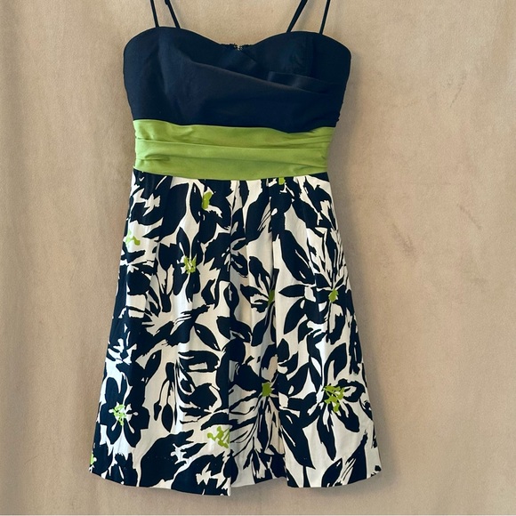 Black, white & green floral mini sundress with empire waist & adjustable straps. - Picture 1 of 5